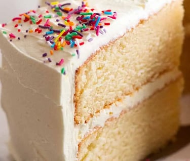 a slice of cake with a slice taken out of it