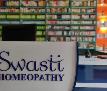 a woman in a white shirt is standing in front of a counter