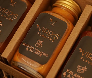 a box of three bottles of sauce