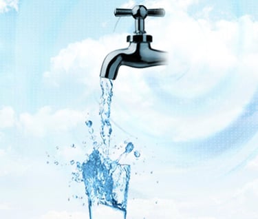 water pouring out of a faucet
