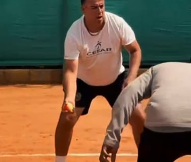 Coach Cesar working with Tennis Infinity Coaches