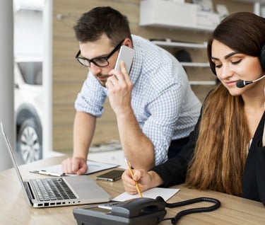 a man and woman in a call center