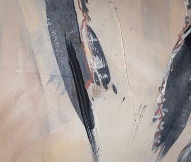 Abstract painting background featuring expressive black, white, and beige brushstrokes on canvas.