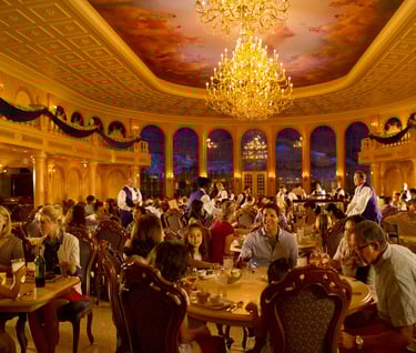 a restaurant with a chandelier