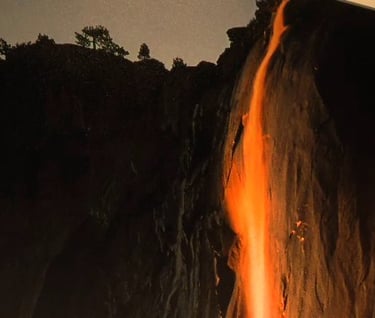 a waterfall flowing down a cliff face