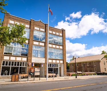 a building with a flag on the side of it