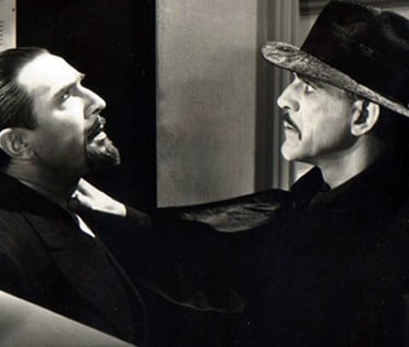 Bela Lugosi menaced by Boris Karloff