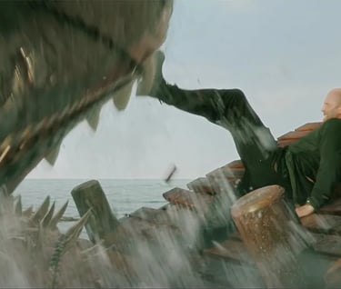 Jason Statham can stop a giant shark with one foot!