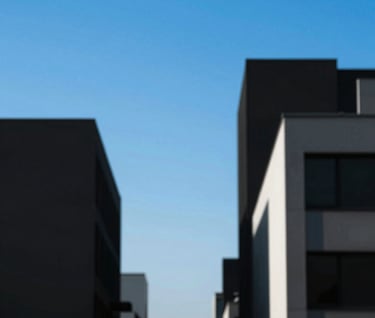 An abstract composition of architectural lines in Paris. Flat #0050B3 blue sky and #1A1A1A black buildings. Graphic, bold, and asymmetric layout.