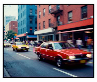 Abstract comic book panel showing a high-speed motion blur of a city street. Flat primary colors #0050B3 and #D4202B. Graphic halftone textures used for shading. Thick black border, 1960s Nouvelle Vague cinema aesthetic.