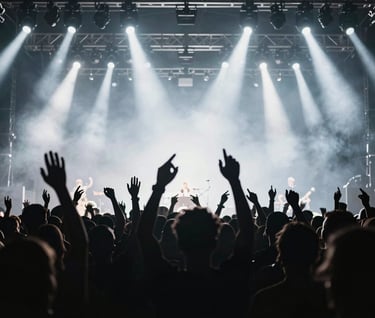Silhouette of a concert crowd with hands raised against a backdrop of flashing white stage lights, deep black foreground, minimalist and energetic rock-and-roll composition, Western European / Dutch music festival.