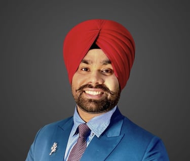 a man in a red turban wearing a blue suit