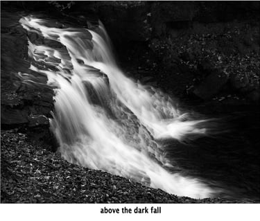 looking down on a dark waterfall