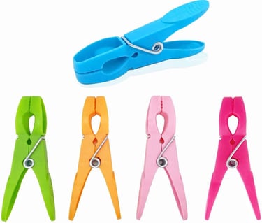 a variety of clothes pegs with a clipping of clothes