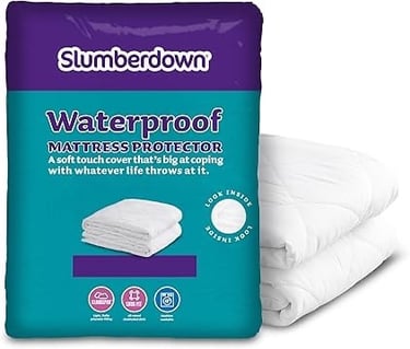 a pillow that is sitting on top of a pillow