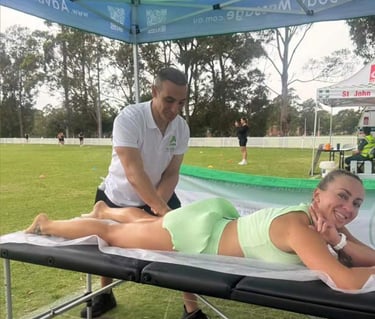 Lady having a sports leg massage in Wollongong HYROX compititon 
