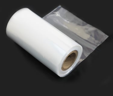 Bobina seladora um pouco desenrolada em fundo preto