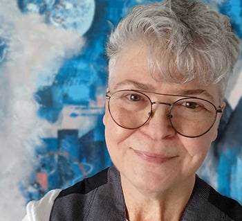 Lillian Cozart with abstract blue background