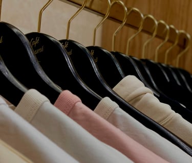 Clothes hanging symmetrically color coordinated 