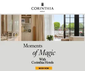 Luxury hotel suite with an elegant bathroom and private balcony at Corinthia Hotels.