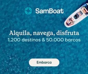 SamBoat rental service aerial view of a motorboat cruising in clear blue water.