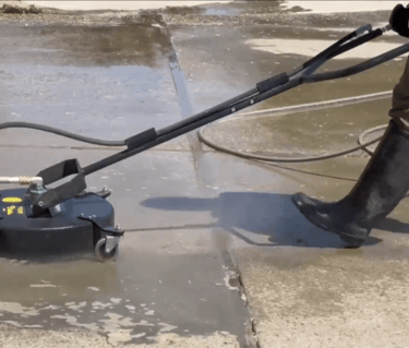 cleaning a driveway with a surfacecleaner