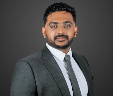 a man in a suit and tie with a beard