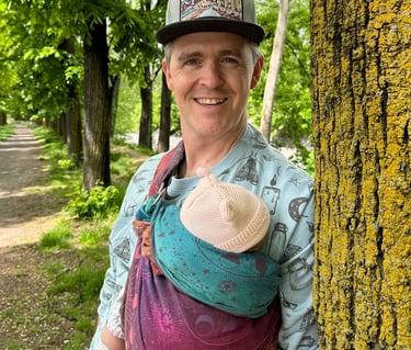 Image of Adam Lofbomm and baby