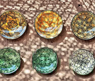 Selection of ceramic plates made in traditional fashion in Tamegroute, stop on Marrakech to M'hamid 
