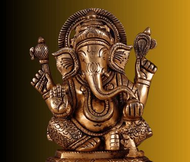 a statue of a gan ganesh idol in brass  