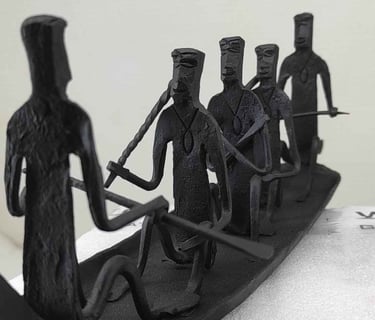 "Bastar tribal iron boat with 5 seated figures – handcrafted Loha Shilp sculpture-Export-ready"