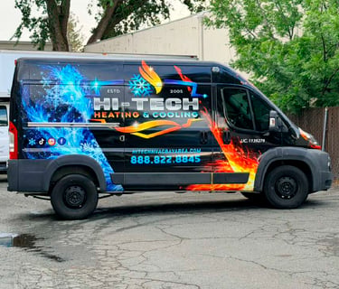 A Hi-Tech Heating and Cooling service van featuring fire and ice graphics for HVAC repair services.
