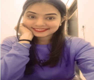 a woman with a purple shirt and a red lipstick