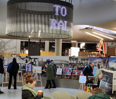 People looking at the artwork