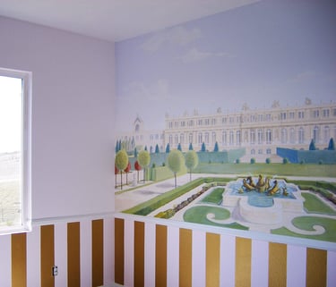 A room adorned with a mural of Versailles and gardens, gold-pink striped dado and a window.