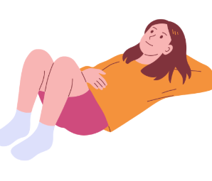 a woman laying down with an orange jumper