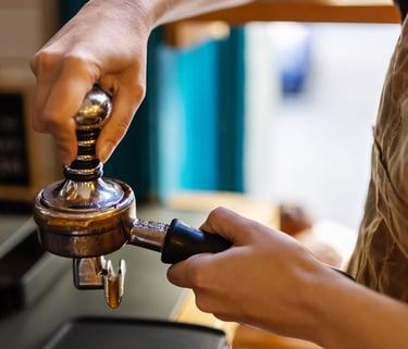 a person is holding a beer tape