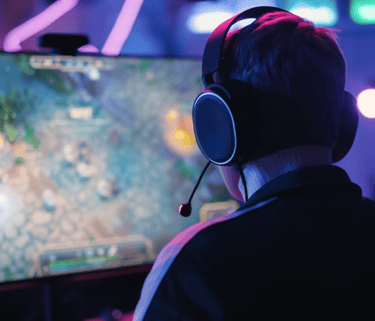 a man wearing headphones and headphones, playing a video game