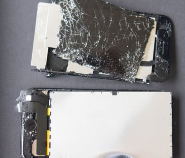 a broken phone with a broken screen and a broken phone