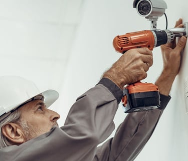 a man in a hard hat and a white helmet