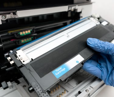 a person in gloves and gloves holding a printer