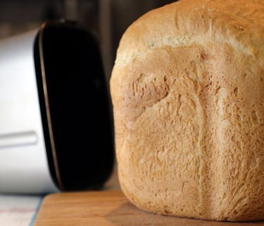 a loafed loafed bread on a cutting board