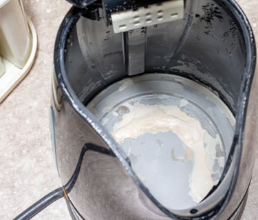 a person is using a blender to make a mess