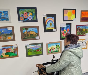 person looking at the artwork