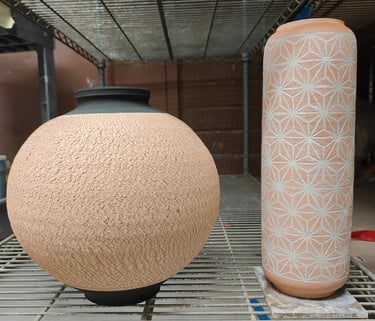 wheel-thrown moon jar and cylinder with contrasting patterns and colors, ready for high fire