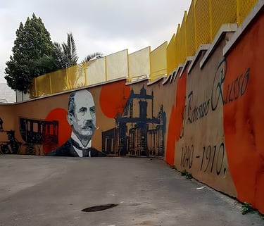 Mural dedicated to Italian historical figures, urban art created by Poliops with warm tones and arch