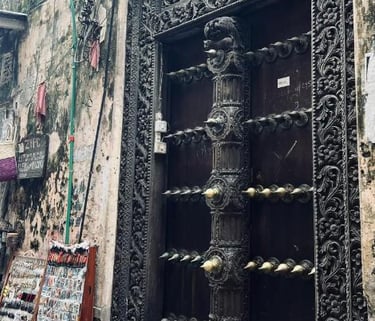 Beautifully carved Zanzibar door in Stone Town, showcasing the island’s rich Swahili and Arab heritage.