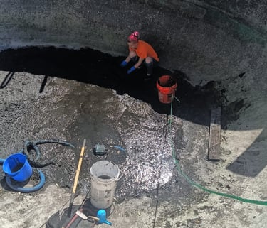 Hand Digging to Remove Mud