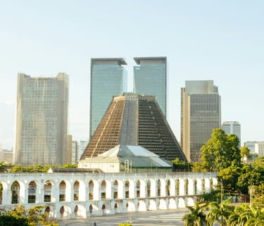 a large building with a clock tower in the background, Rio de Janeiro, Brazil