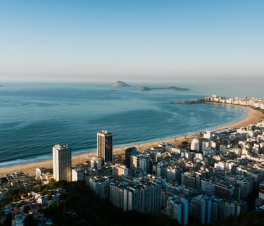 a view of a city with a beach and a view of the ocean, Copacabana, Rio de Janeiro, Brazil